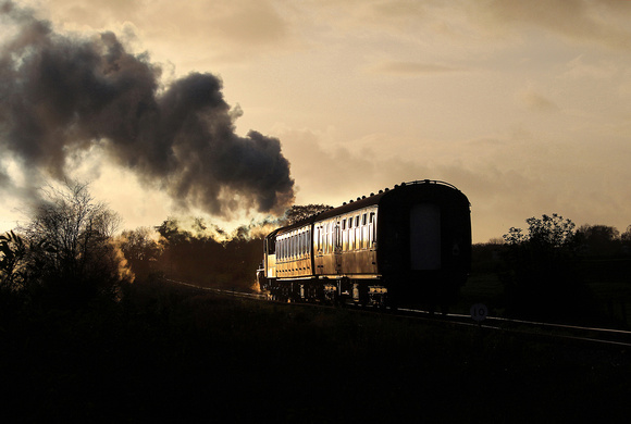 46447 heads into the sunset at Cranmore West.