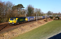 70005 heads past Hincaster with its Coatbridge to Daventry.