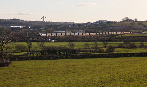 66555 heads away from Carnforth on 15.2.16 with Russells Daventry to Coatbridge.