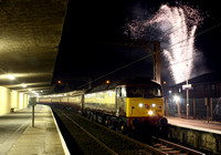 47832 waits at Carnforth with the 'Guy fawkes' Northern Belle as a fireworks display is set off.