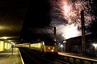 47832 waits at Carnforth with the 'Guy fawkes' Northern Belle as a fireworks display is set off.