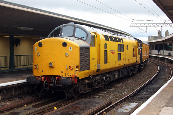 97301 passes through Carnforth with a test train to Derby via the Cumbrian Coast on  11.10.11