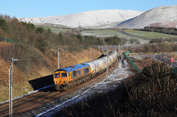 66736 passes Beck Foot on 17.1.24 with 4Z03 11.25 Carlisle N.Y. to Clitheroe Castle Cement.