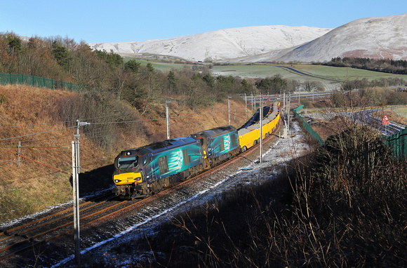 68005 & 68004 pass Beck Foot on 17.1.24 with 6K06 12.11 Shap Summit Quarry to Crewe Basford Hall.