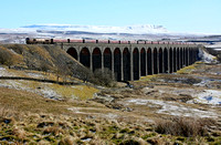 66008 heads over Ribblehead viaduct with a N/bound Coal 2.3.10