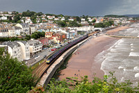 A Penzance service passes Dawlish on the 12.8.14 as a storm brews behind.
