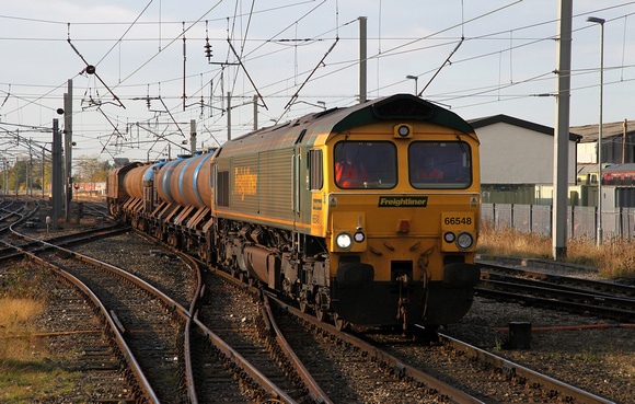 Hire in to DRS 66548 heads away from Carnforth with 3J11 on 15.10.15.
