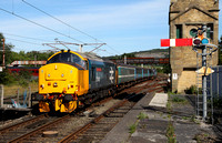 37401 hangs on the rear of the Preston to Barrow as it heads away from Carnforth on 13.8.15.
