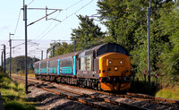 37409 heads the return working past Bolton Le Sands on 7.9.15.