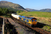 66737 heads past Torlundy on 31.5.21 with 6E45 08.07 Fort William to North Blyth alcans.