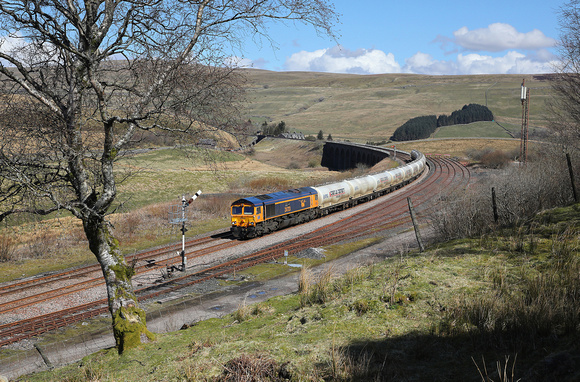 66723 passes Garsdale on 12.4.21 with its Carlisle to Clitheroe empty cements.