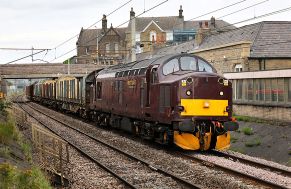 37706 arrives at Carnforth on 26.7.19 with log wagons from Carlisle to WCR for Tyre turning.