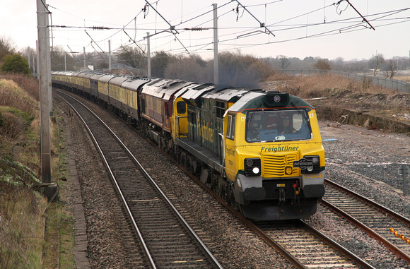 70004 & 66089 pass Hest Bank 'off ' route with the 'Scenic Settler' to Carlisle on 23.3.13.