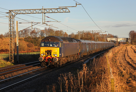 57310 passes Daresbury  on 15.12.21 with 'Orions' 05.34 Shieldmuir to Willesden fast freight service.
