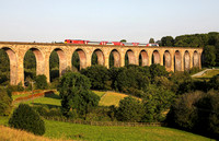 67015 passes over Cefn Mawr viaduct on 19.7.21 with 1W96 17.12 Cardiff Central to Holyhead.