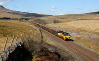70812 approaches Shotlock Tunnel with 6J37 Carlisle to Chirk logs on 12.4.21.