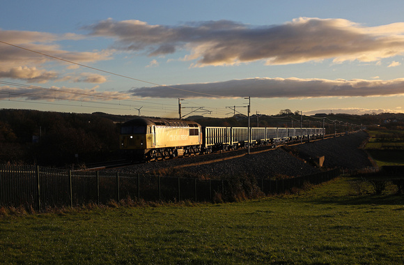 56113 heads away from Carnforth with its Longport to Carlisle move on 21.11.21.