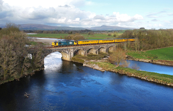 37025 heads over the River Lune at Arkholme on 26.3.21 with its Blackpool North to Derby test train.