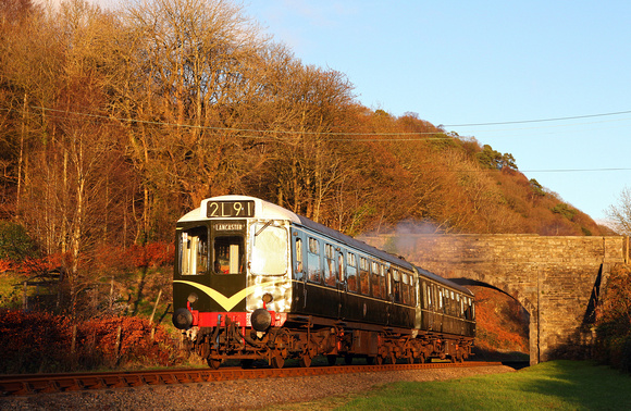 In the last sunlight of the day the Lakesides 110 departs from Newby Bridge.