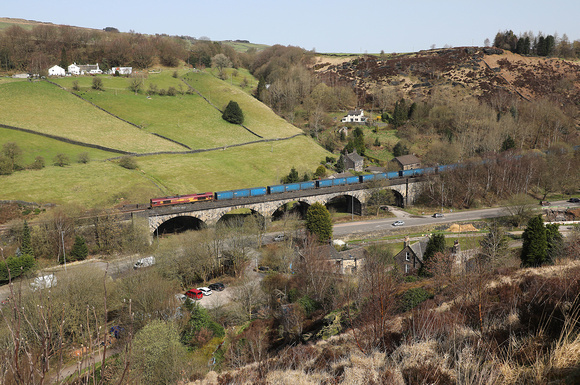66067passes over Lobb mill Viaduct with the Wilton to Knowsley bins.