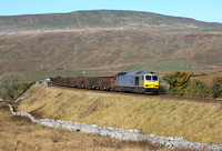 60066 passes Ribblehead on 21.10.21 with its Newbiggin to Tees Dock empties.