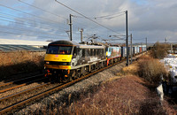 DB 90039 & 90024 pass Carnforth on 4.2.22 with 4M25 Mossend to Daventry.