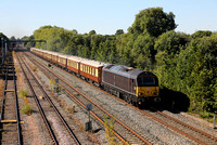 67005 passes Hinksey yard on 10.8.22 with a Bicester Village to London Victoria Belmond Pullman.