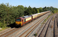 67024 passes Hinksey yard on 10.8.22 with a Bicester Village to London Victoria Belmond Pullman.