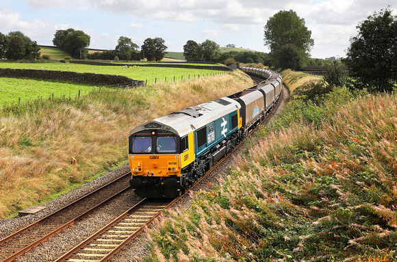 66789 heads past Long Preston on 13.9.19 with 6M31 09.29 Doncaster to Arcow Quarry.