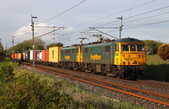 86613 & 86628 head away from Carnforth after being looped with 4M74 Coatbridge to Crewe on 15.5.14.