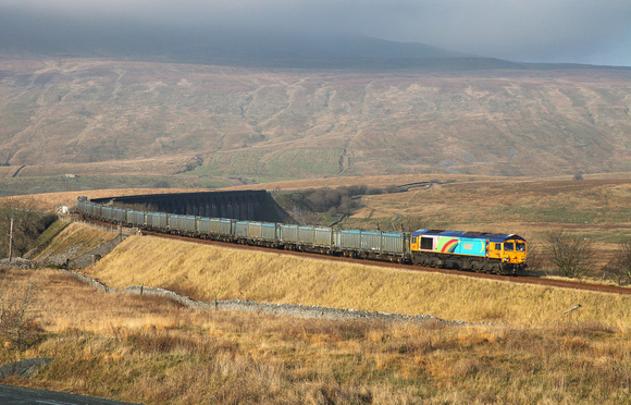 66720 heads past Ribblehead with the Newbiggin to Middlesbrough Dawson empty Gypsum working. The train had worked North from Drax earlier in the morning.