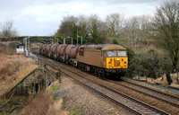 56090 passes Long Preston on 11.12.19 with the Workington Docks to Arpley Slurry Tanks.