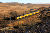 37099 heads towards Shap summit on 1.12.19 with the 0830 Derby R.T.C. to Slateford Depot.