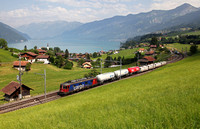 620 059-6 heads past Faulensee Switzerland on 7.7.15 with the afternoon freight from Leissigen to Spiez.
