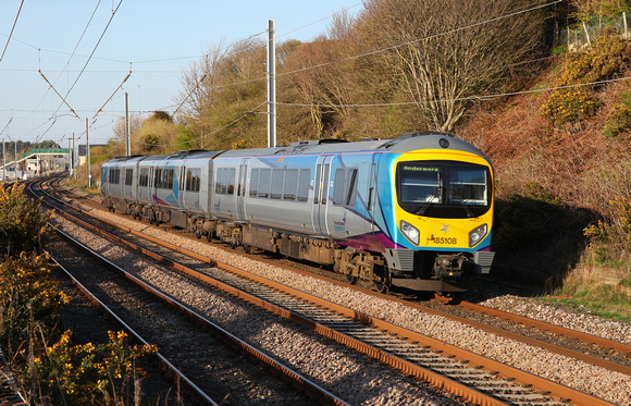 185108 passes Hest Bank in its new livery on a Barrow to Windermere service.