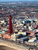 Blackpool Tower with a Tram passing and North Station behind.