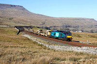 68005 heads upto Ais Gill summit on 1.3.21 with 6K05.