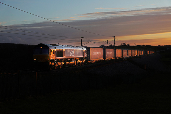 66091 heads away from Carnforth with the delayed 4S44 on 25.1.21.