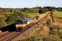 66849 heads past Kings Sutton on 10.8.22 withthe 17.54 Hinksey to Bescot engineers.