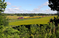 43274 & 43290 pass Daresbury on 22.6.22 with 1Q26 Derby to Carlisle.