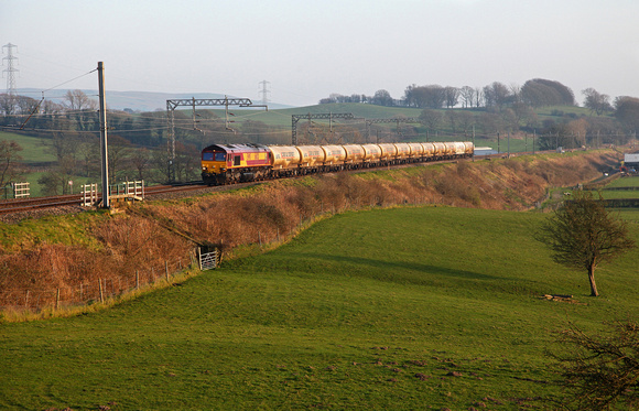 66021 heads past Bay Horse on 27.3.17 with the Clitheroe to Mossend Cements.