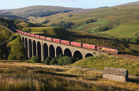 66088 heads over Arten Gill viaduct on  31.8.13 with a Drax to Carlisle service.