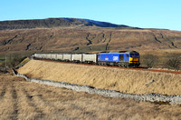 60026 'Helvellyn' passes Ribblehead on 9.12.22 with 6E69 12.54 Ribblehead Vq to Hunslet.