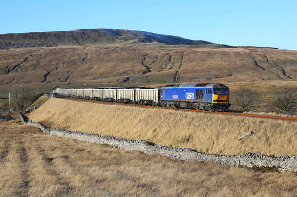60026 'Helvellyn' passes Ribblehead on 9.12.22 with 6E69 12.54 Ribblehead Vq to Hunslet.