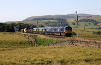 66424,423,563 & 569 pass Greenholme on 28.6.19 with its Crewe to Carlisle engineers,