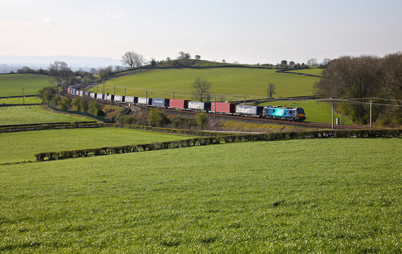 88010 head past Hincaster Jc on 12.4.19 with the Tesco Express.