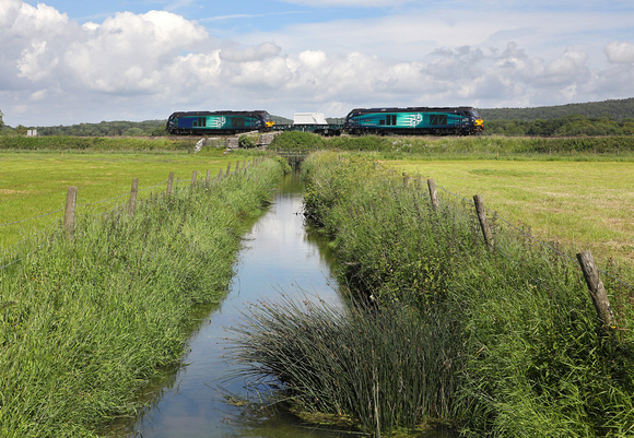 68001 & 68005 head past Black Dyke with 6C51 Sellafield to Heysham on 18.6.19