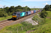 88008 passes Yealand on 3.7.19 with 04.43 Mossend Pd Stlg to Daventry Int.