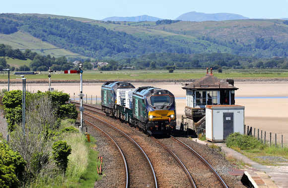 68002 & 68034 pass Arnside box with 6C51 to Heysham on 27.6.19.