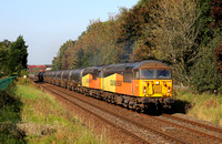 56113 & 56090 head away from Bamber Bridge on 21.9.20 with the Preston Docks to Lindsey empties.